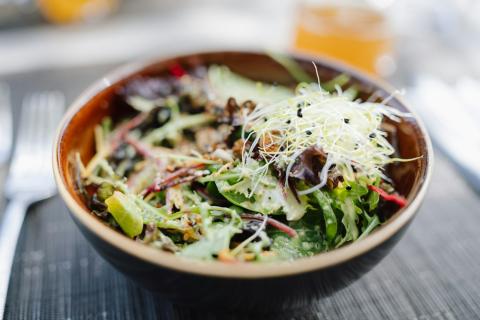 Fresh salad in a rustic bowl with sprouts - indicative photo for the Vietnamese Salad group
