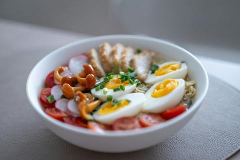 Bowl of noodles with chicken, eggs, and vegetables - indicative photo for the Noodles Soup - Pho group