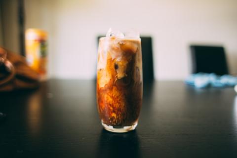 Tall glass of iced soft drink